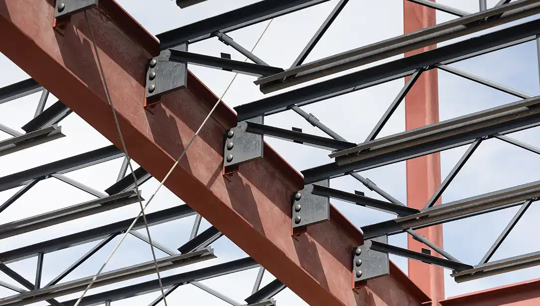 Flush-frame steel joists to beam