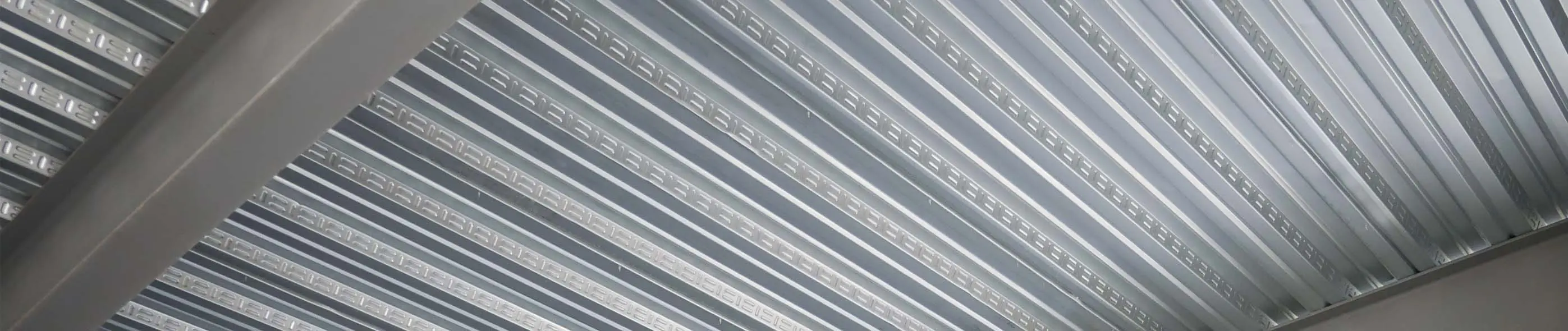 Standard Composite Floor Deck close up embossments in the vertical ribs